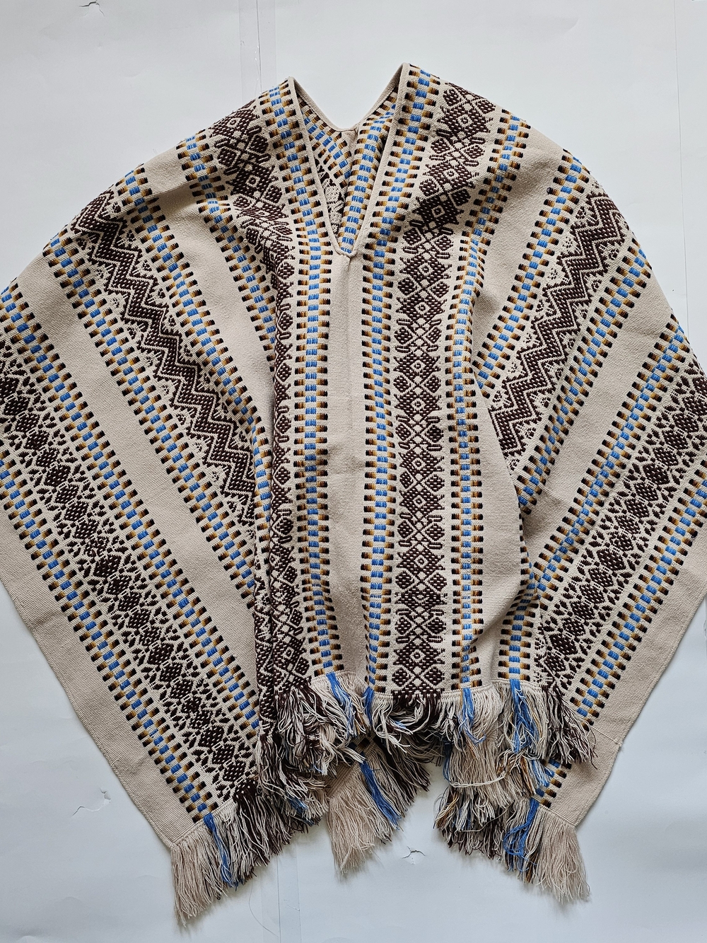 Beige Patterned Fringe Knit Poncho with Blue Accents
